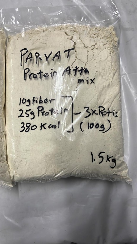Parvat Protein Atta mix pack labelled with 25g protein, 10g fibre, and 380 kcal per 100g